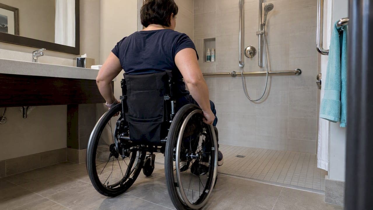 Wheelchair Users: Check Roll In Shower Hotels for 1/2 Inch Thresholds